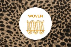 Cross section of yarns in a woven carpet on a black and white checked carpet background